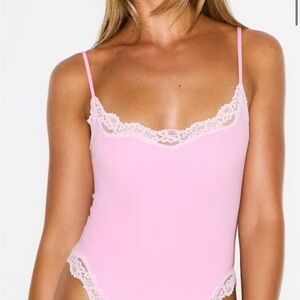 SKIMS Pink Lace Bodysuit